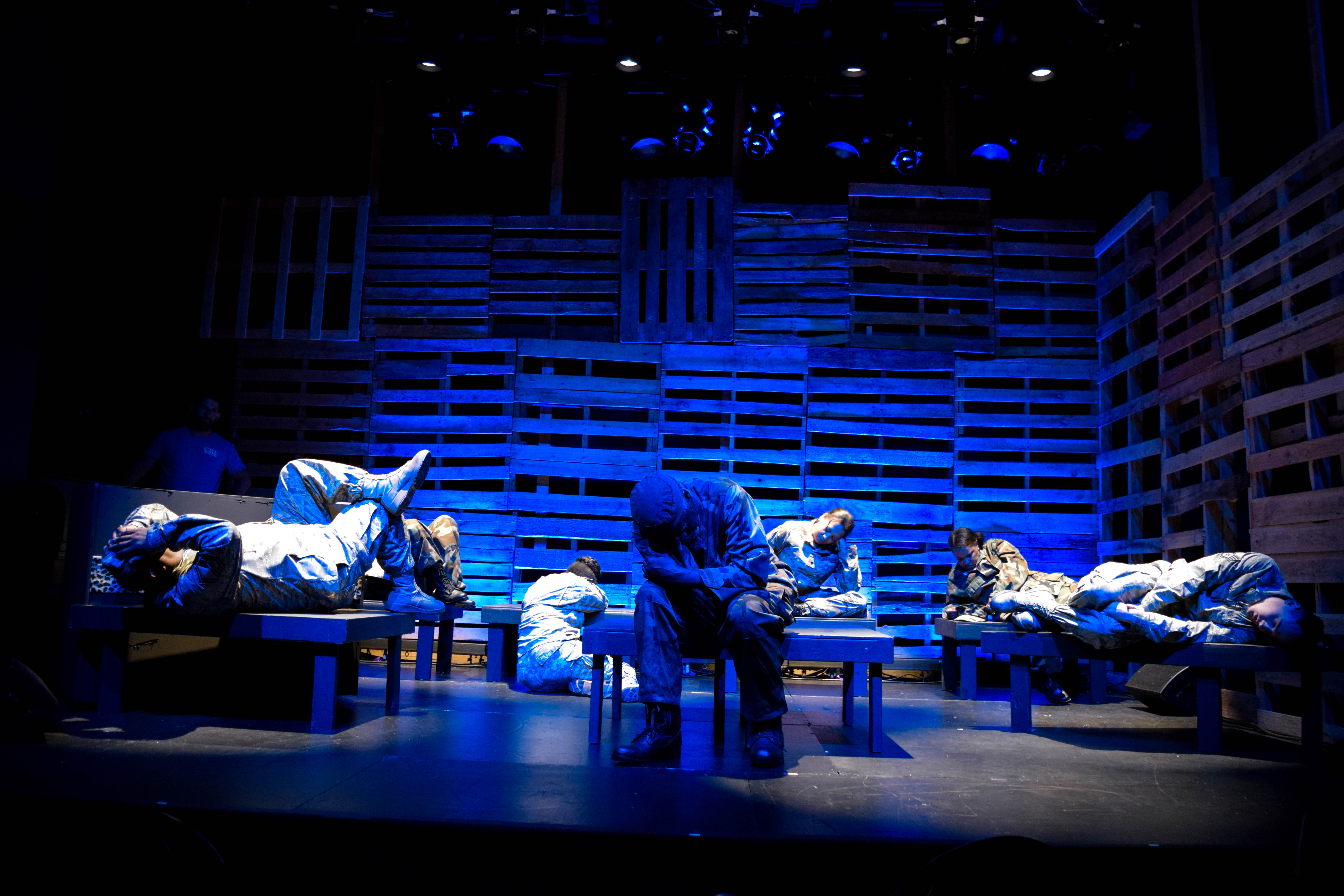 Soldiers sleeping in a performance of Marching On at The Wallis.  PHOTO CREDIT: Nate Albus